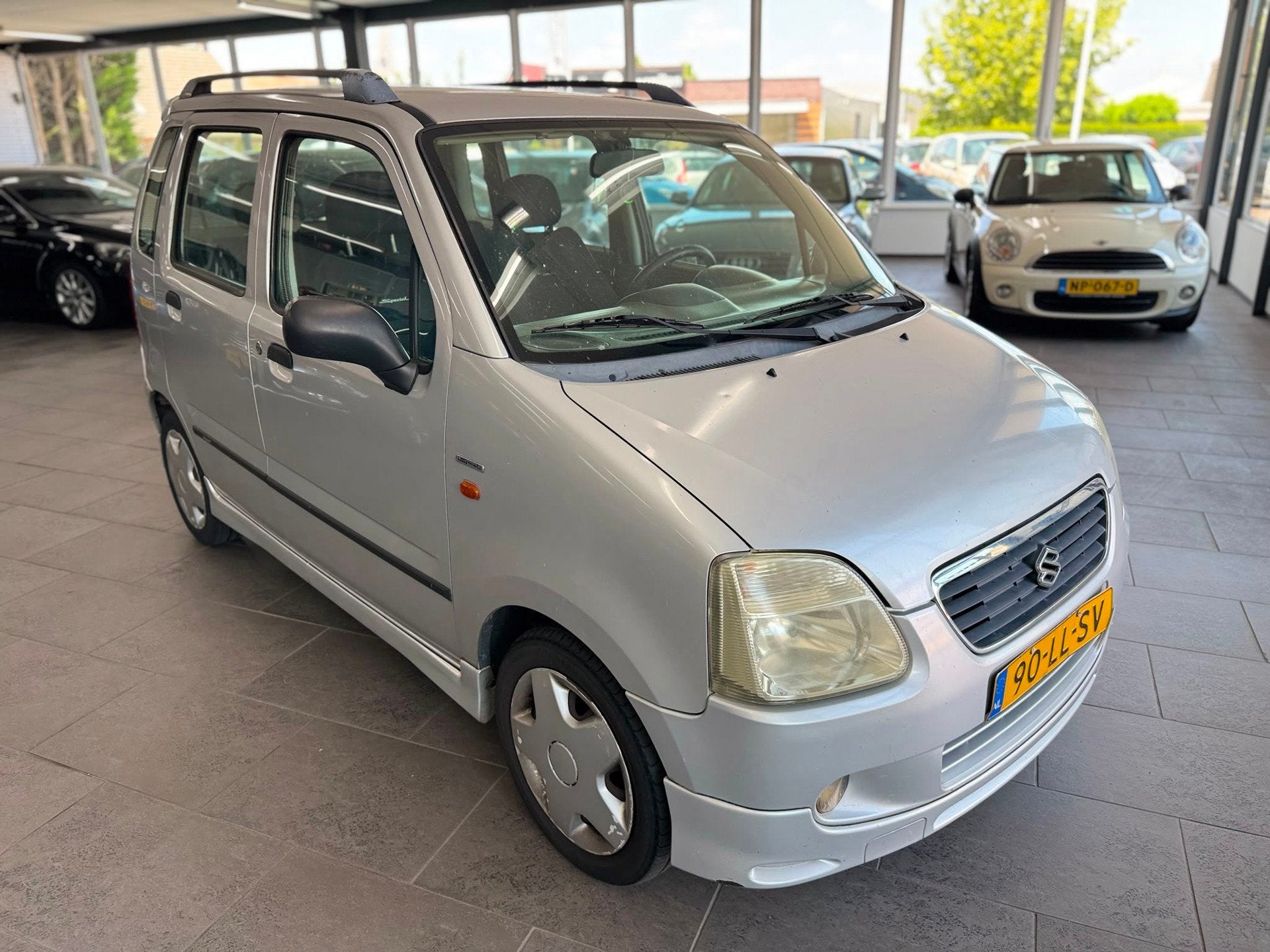 Suzuki Wagon R+ 1.3 Special 5-deurs airco elektrische pakket, Voorwielaandrijving, Stof, Gebruikt, Zwart