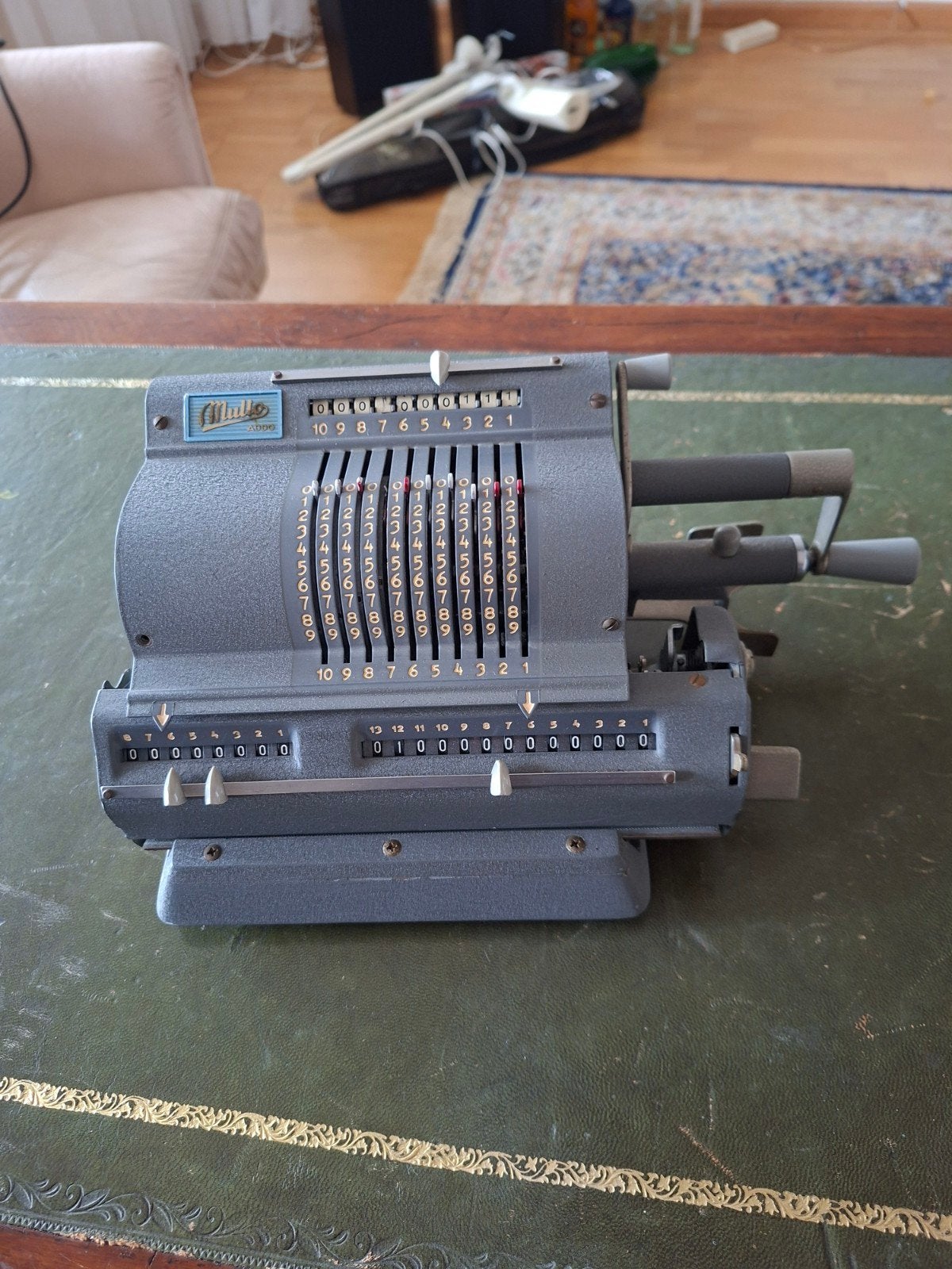 Antieke Mullo Addo mechanische rekenmachine, Ophalen