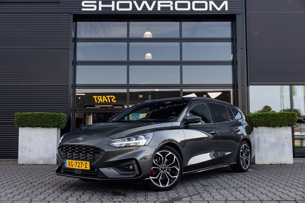 Ford Focus Wagon 1.5 EcoBoost ST Line, 182pk, Pano, B&O Deal, Auto's, Metallic lak, Gebruikt, 700 kg, Leder en Stof