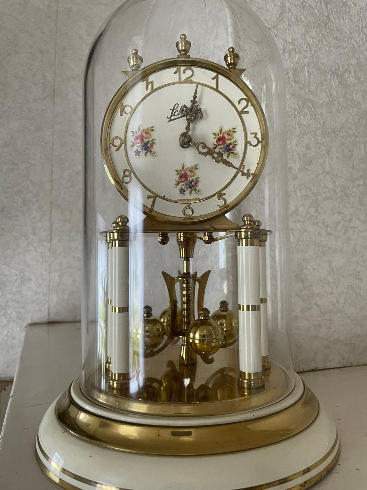 Pendule klok, Ophalen
