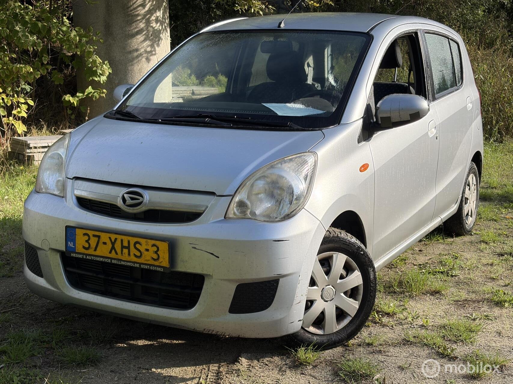 Daihatsu Cuore 1.0 Comfort..AircoNet ingereden!, Voorwielaandrijving, Stof, Zwart, 18 €/maand
