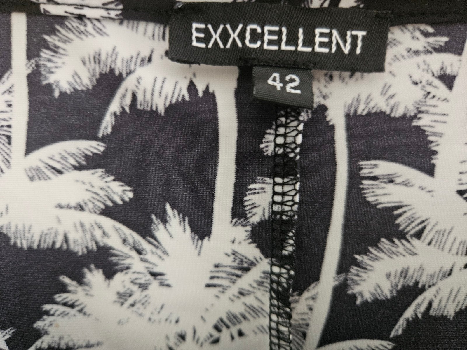 Exxcelent gaaf jurkje met palmbomen mt 42, Zwart, Maat 42/44 (L), Ophalen of Verzenden, Zo goed als nieuw