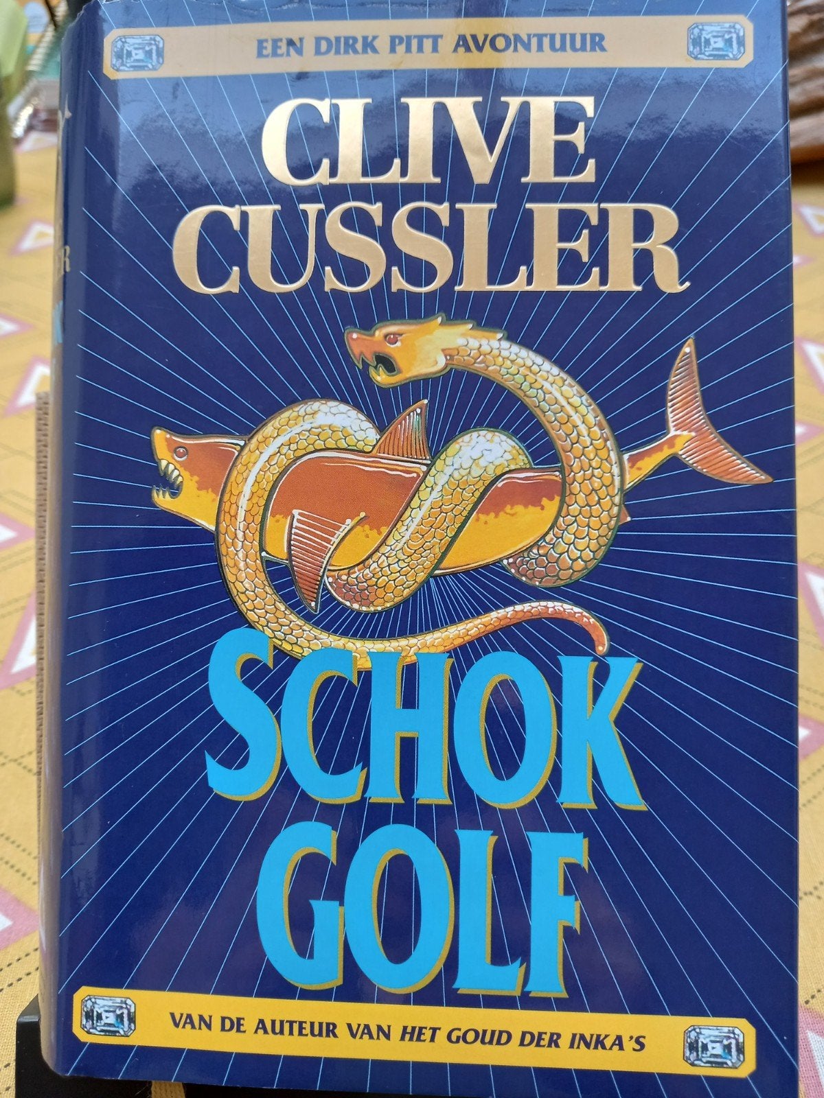 Schokgolf van Clive Cussler., Boeken, Ophalen of Verzenden, Gelezen, Clive Cussler