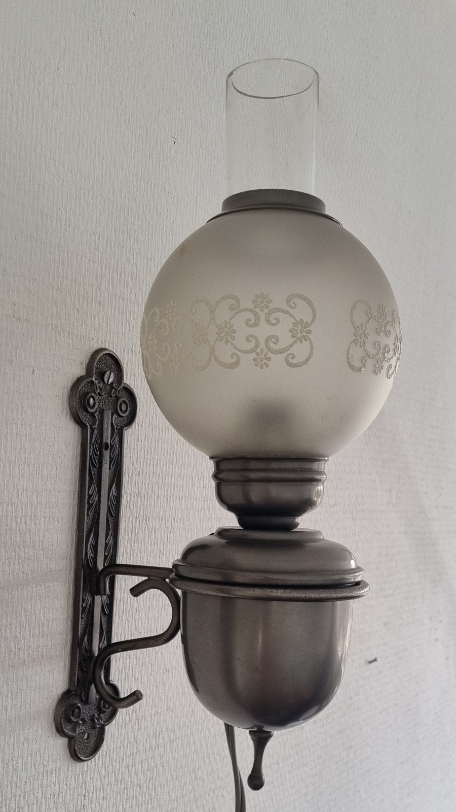 Tinnen wandlampen, Ophalen