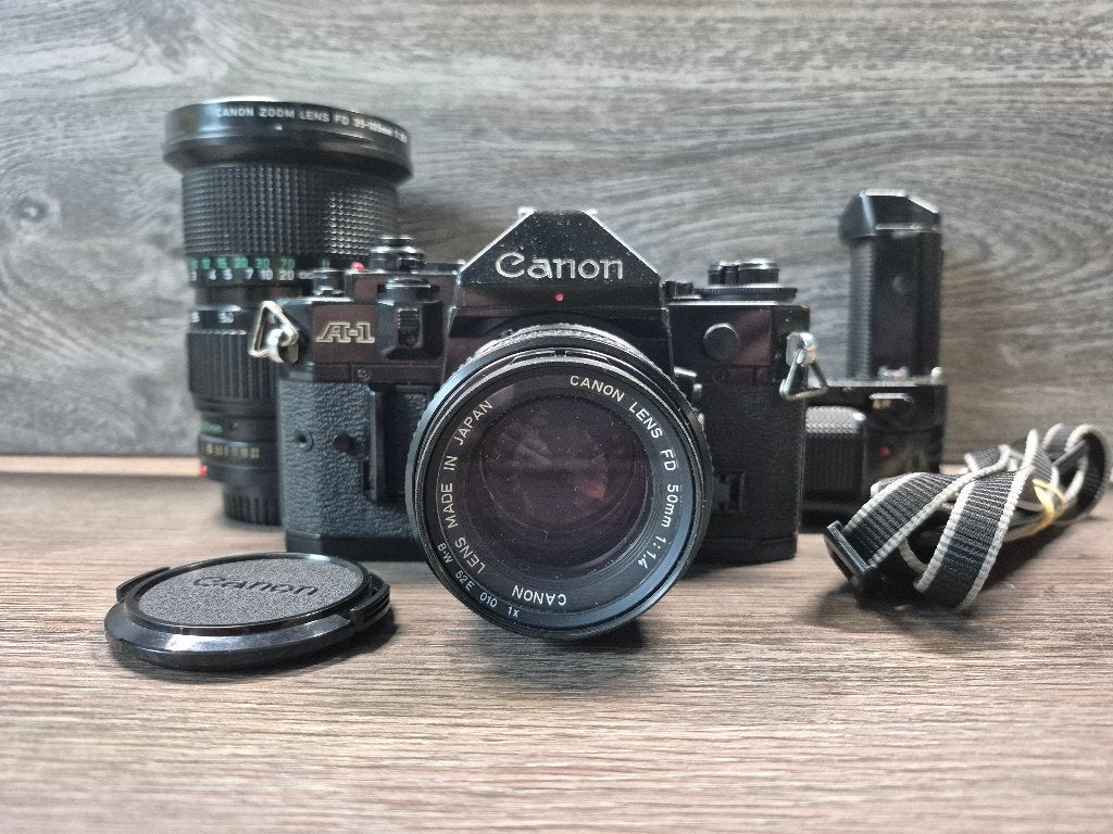 Canon A-1 set + FD 50mm f/1.4 + FD 35-105mm f/3.5 + Motor, Audio, Tv en Foto, Ophalen of Verzenden, Gebruikt, Spiegelreflex, Canon