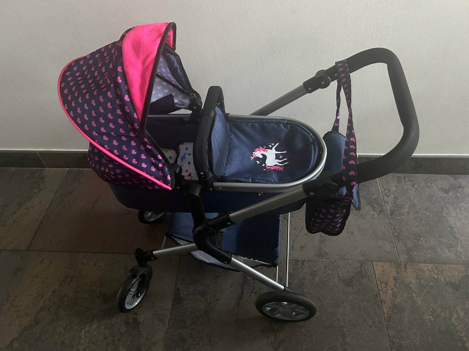 Poppenwagen bayer unicorn blauw roze inclusief dekbedje, Ophalen, Zo goed als nieuw, Babypop