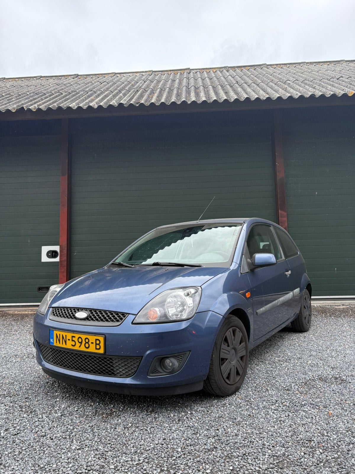 Ford Fiësta 1.4 16V 3DR 2006 Blauw, Voorwielaandrijving, Stof, 40 €/maand, Zwart