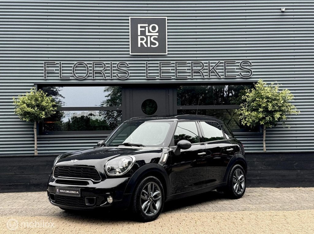 Mini Countryman 2.0 SD ALL4 | Pano dak | Xenon | Zwart Leer, Auto's, Mini, Automaat, Euro 5, Zwart, Leder