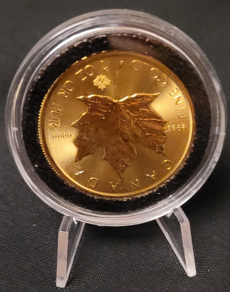 1 ounce gouden munt Maple Leaf  en andere, Ophalen of Verzenden, Goud