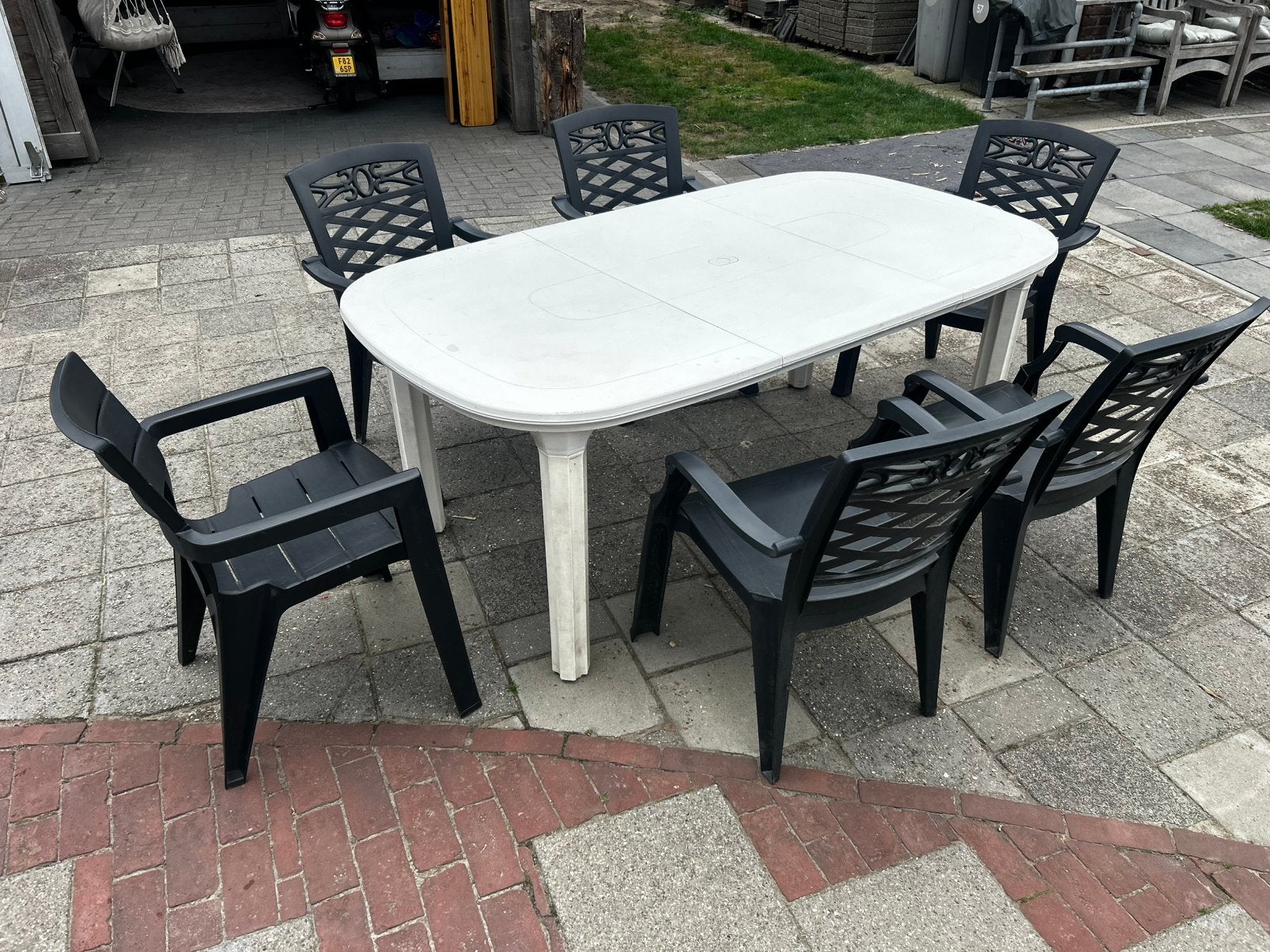Oerdegelijke kunststof tuintafel (Hartman) met 6 stoelen, Ophalen, Gebruikt, Rechthoekig, Kunststof