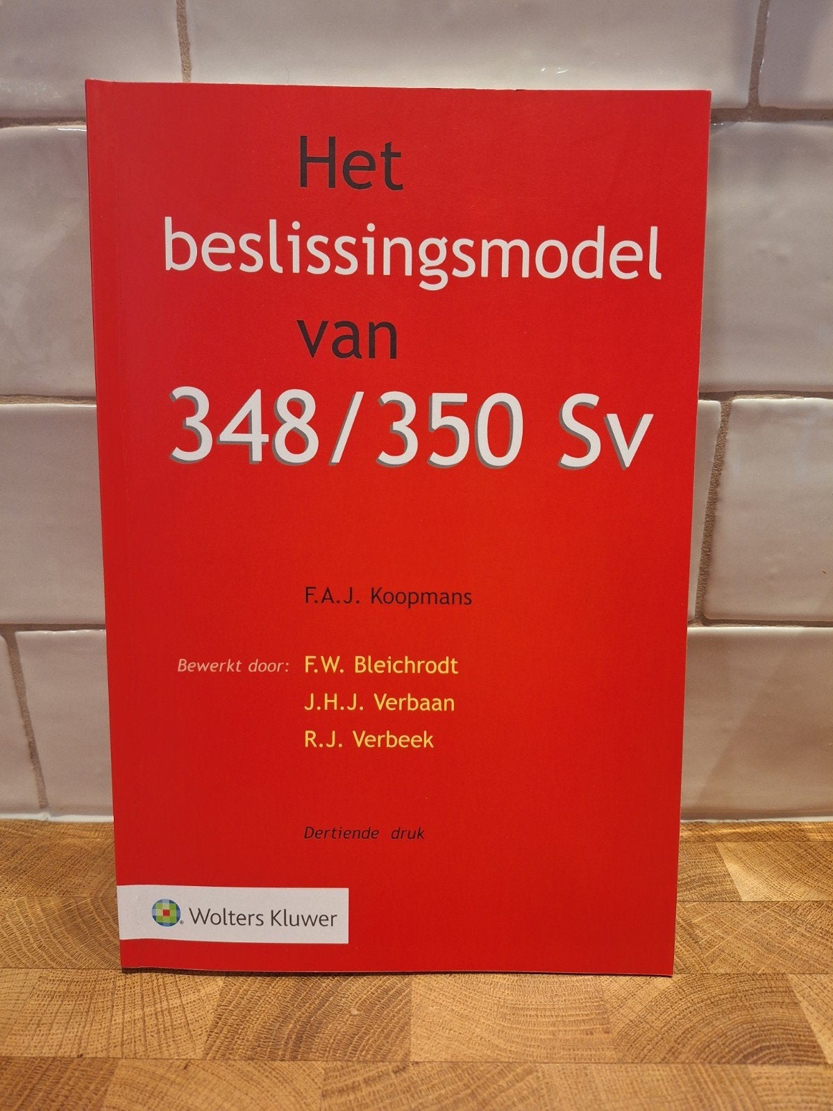 Het beslissingsmodel van 348/350 Sv - Dertiende druk, Gelezen, F.A.J. Koopmans, Ophalen of Verzenden, WO
