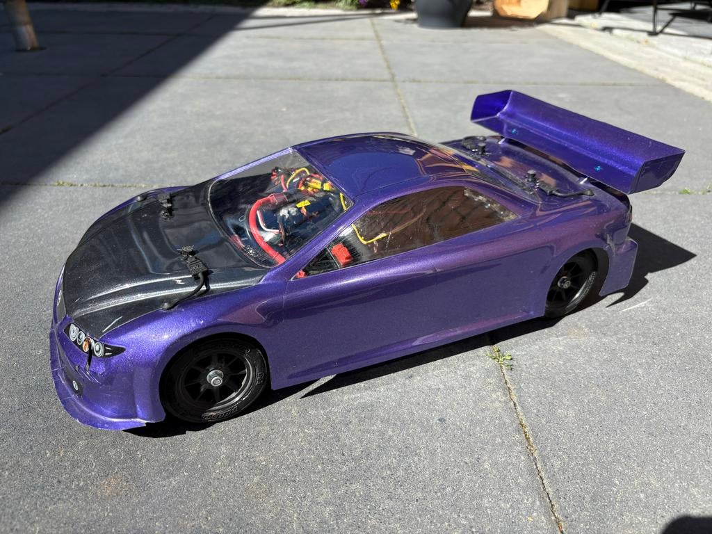 Tamiya TT-02 RC auto met 2 kappen, lader en accu, Zo goed als nieuw, Schaal 1:10, Auto onroad, RTR (Ready to Run)