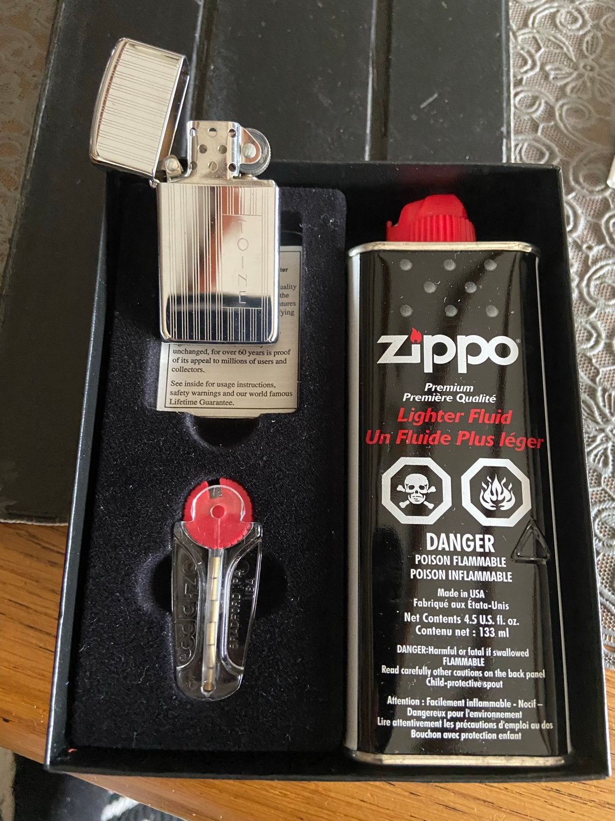 Zippo aansteker compleet met vulling en sleutelhanger, Ophalen of Verzenden, Zo goed als nieuw, Aansteker