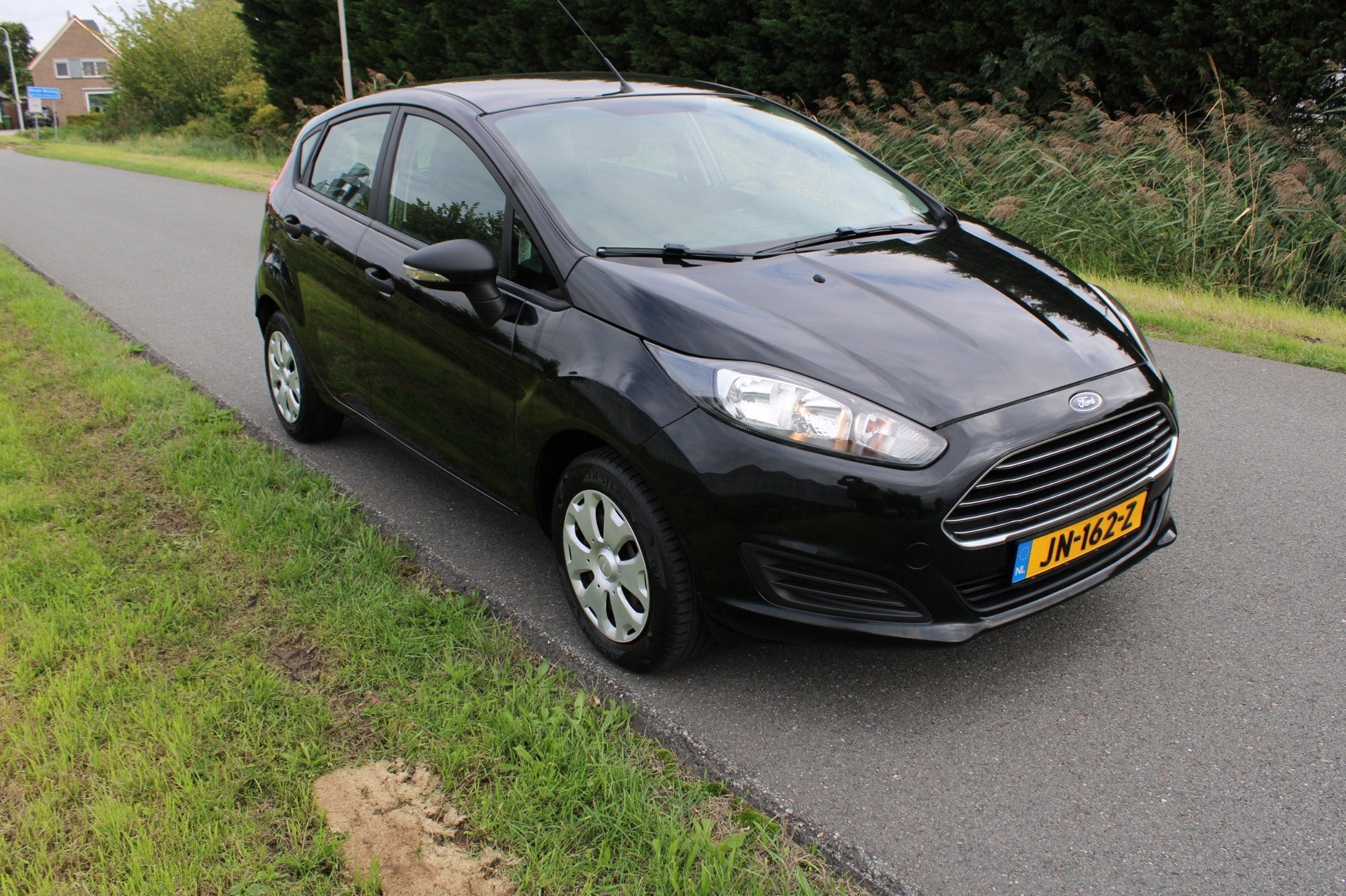 Ford Fiesta 1.25 5 Drs met Airco, Auto's, 4 cilinders, 60 pk, Zwart, Bedrijf
