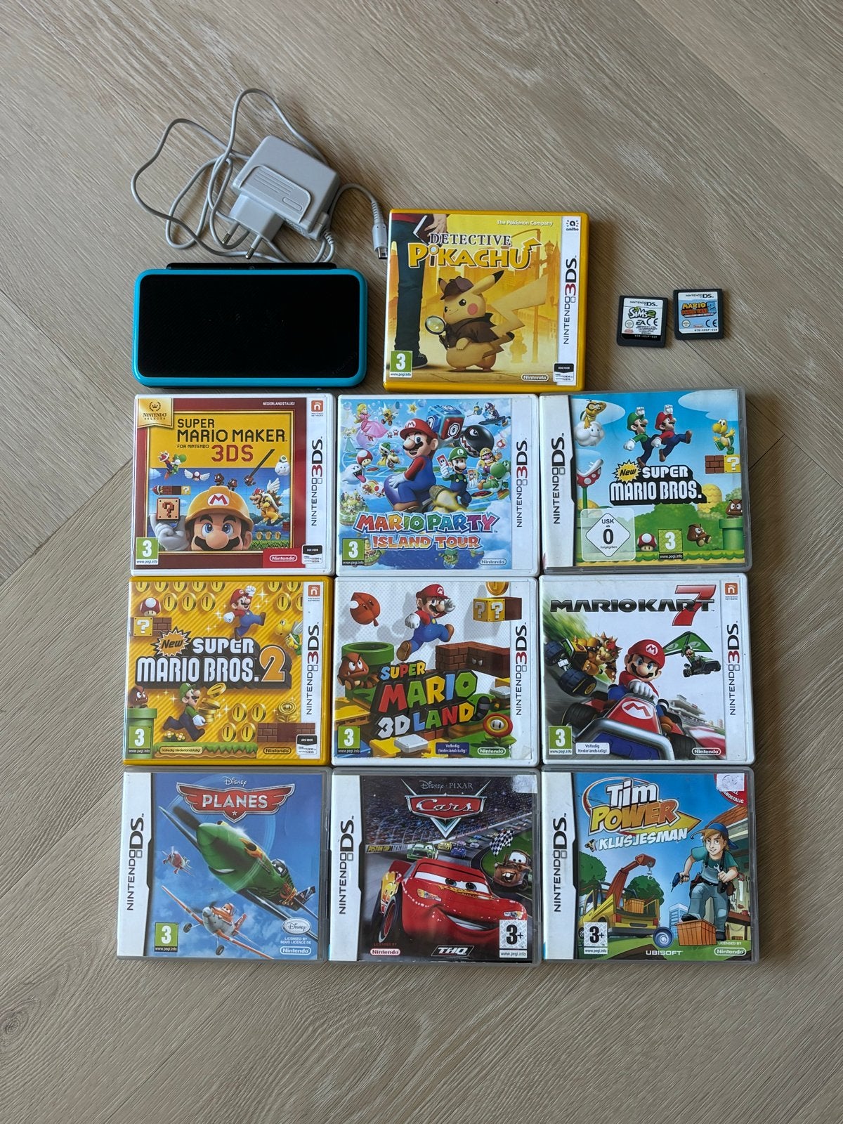 New Nintendo 2DS XL met 12 spellen en oplader, Ophalen of Verzenden, Gebruikt, Met games, Zwart