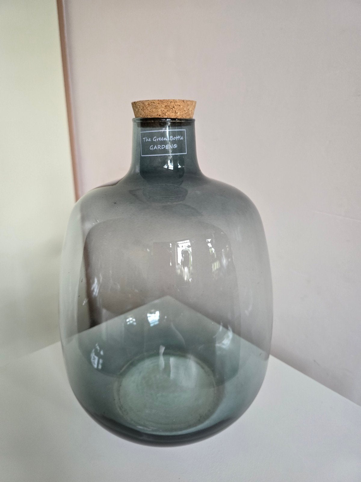 fles met kurk, Ophalen