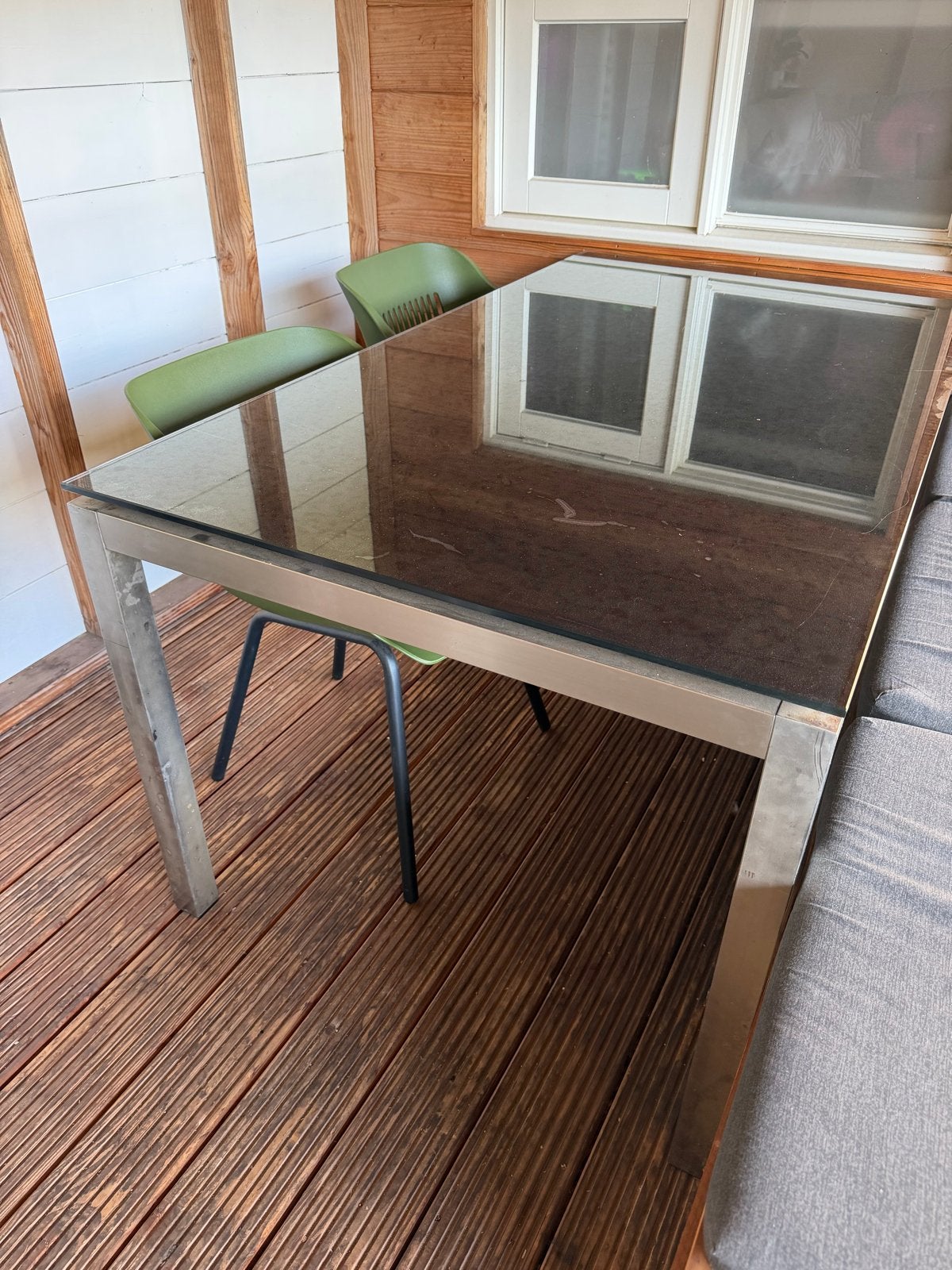 Glazen eettafel met metalen onderstel, Huis en Inrichting, Tafels | Eettafels, Ophalen, Gebruikt, 50 tot 100 cm, Glas