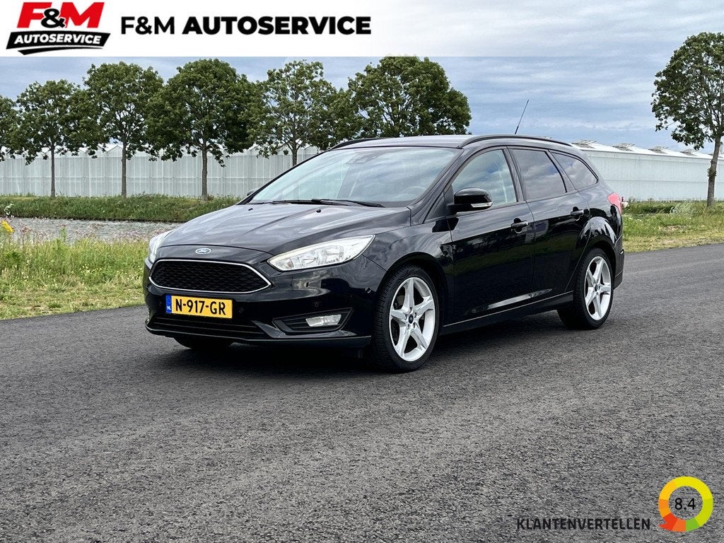 Ford Focus Wagon 1.0 Titanium Edition Clima, cruise, stoel-s, Gebruikt, Euro 6, Automatische klimaatregeling, Zwart