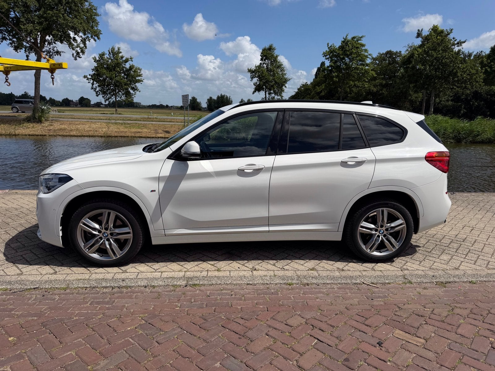 BMW X1 sDrive20i MSport|Pano|HUD|Harman Kardon|Elek. stoelen, Auto's, BMW, 1998 cc, 1800 kg, Skiluik, Wit