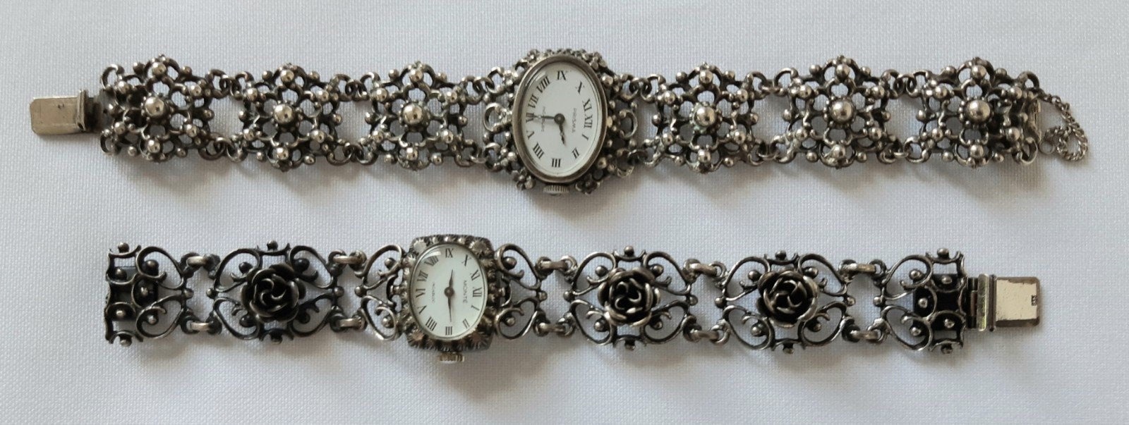 2 zilveren Prisma Roosjes Horloges - gekeurd 835, Ophalen of Verzenden, Zilver, Overige merken, 1930 tot 1960