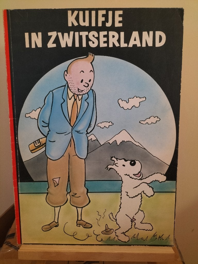 Kuifje in Zwitserland, Parodie uitgave voor volwassenen, Eén stripboek, Ophalen of Verzenden, Zo goed als nieuw, Dennis Filip