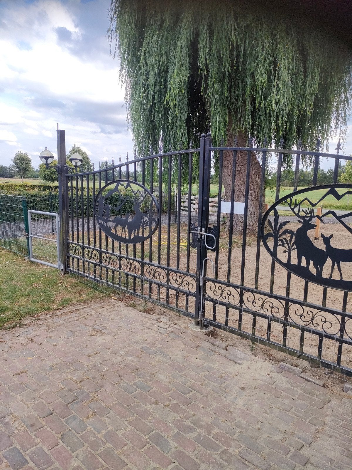sterke Sierpoort 6 meter met hertenmotief, Tuin en Terras, Ophalen, Zo goed als nieuw, IJzer, Sierhekwerk