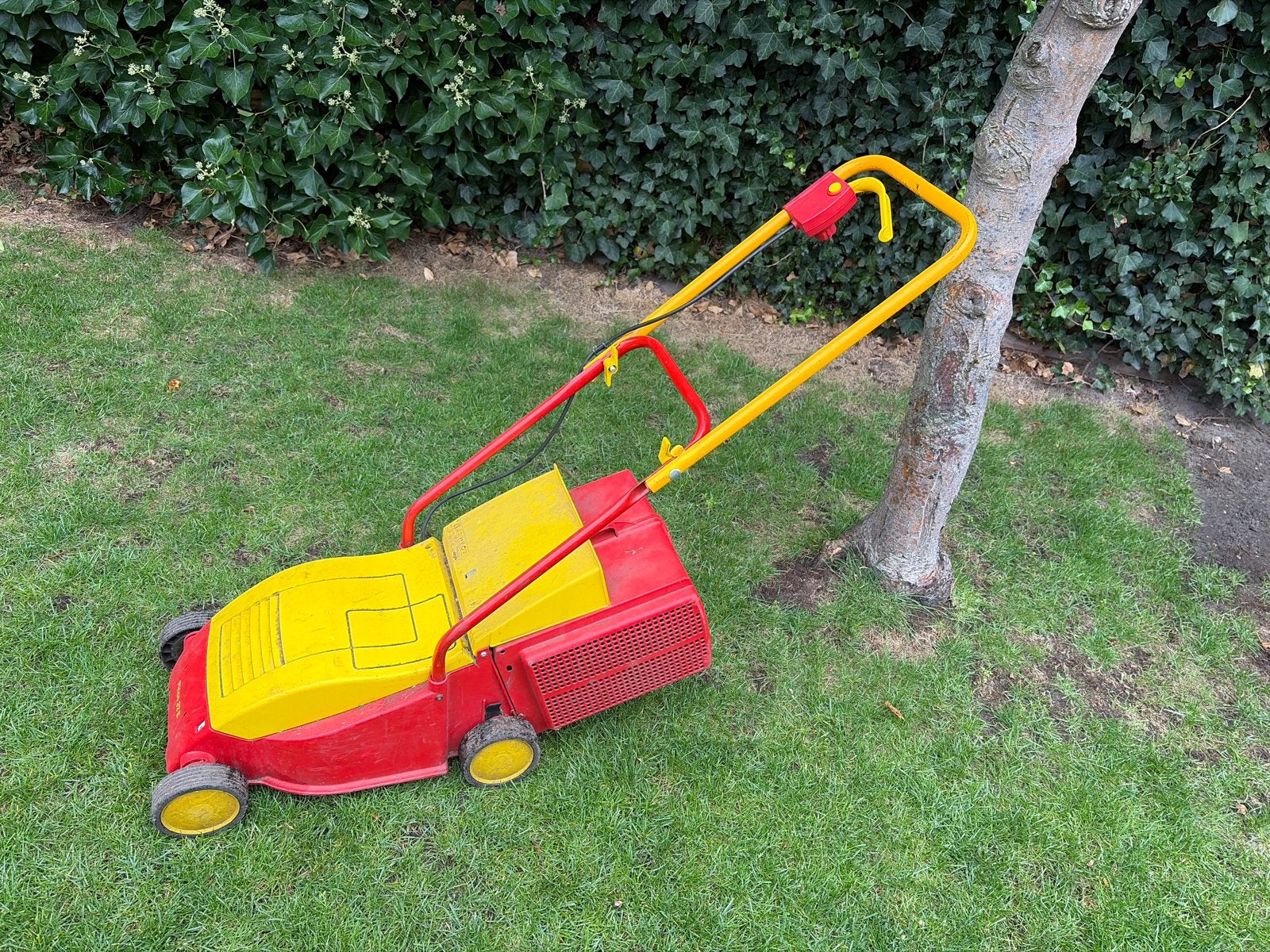 WOLF-Garten grasmaaier - Elektrisch, 32 cm maaibreedte, Tuin en Terras, Grasmaaiers, Cirkelmaaier, Gebruikt, Elektrische grasmaaier