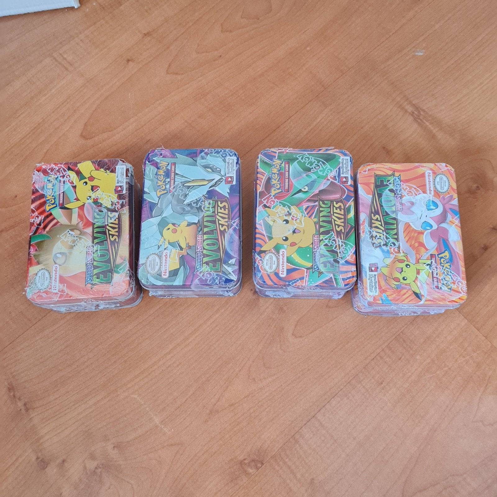 Pokémon Evolving Skies Mini Tins (4 stuks), Hobby en Vrije tijd, Ophalen of Verzenden, Nieuw, Overige typen