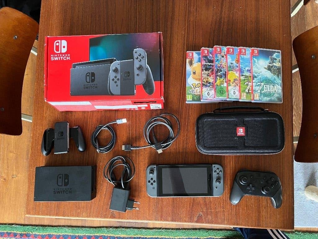 Nintendo Switch V2, compleet met 6 games en Pro Controller, Spelcomputers en Games, Spelcomputers | Nintendo Switch, Ophalen, Zo goed als nieuw