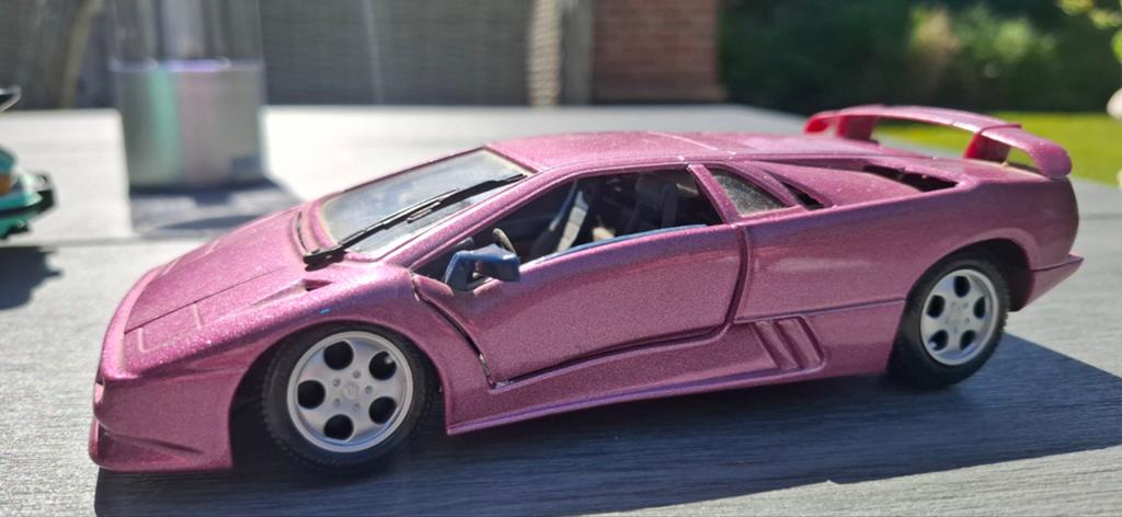 Roze Lamborghini Diablo SE30 1:24 Maisto, Ophalen of Verzenden, Zo goed als nieuw, Auto, Overige merken