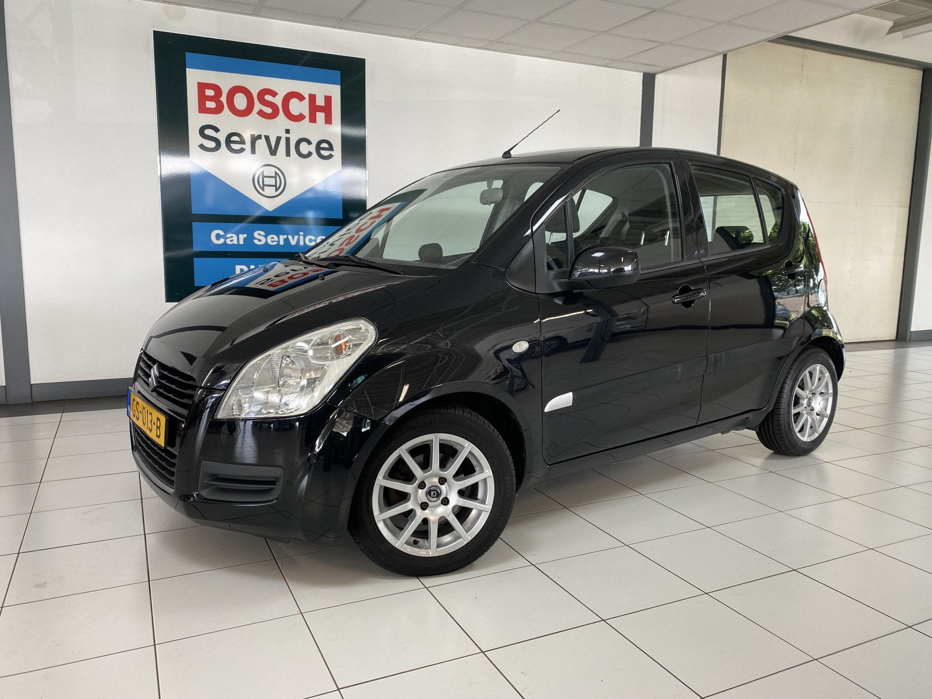 Suzuki Splash 1.2 Comfort Automaat Airco (bj 2012), Auto's, Stof, 4 cilinders, Emergency brake assist, Zwart