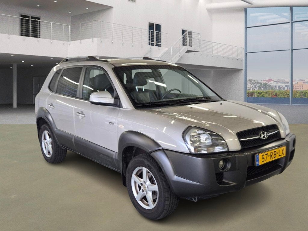 Hyundai Tucson 2.7i V6 4WD Style, Auto's, Automaat, Gebruikt, 2656 cc, Bedrijf