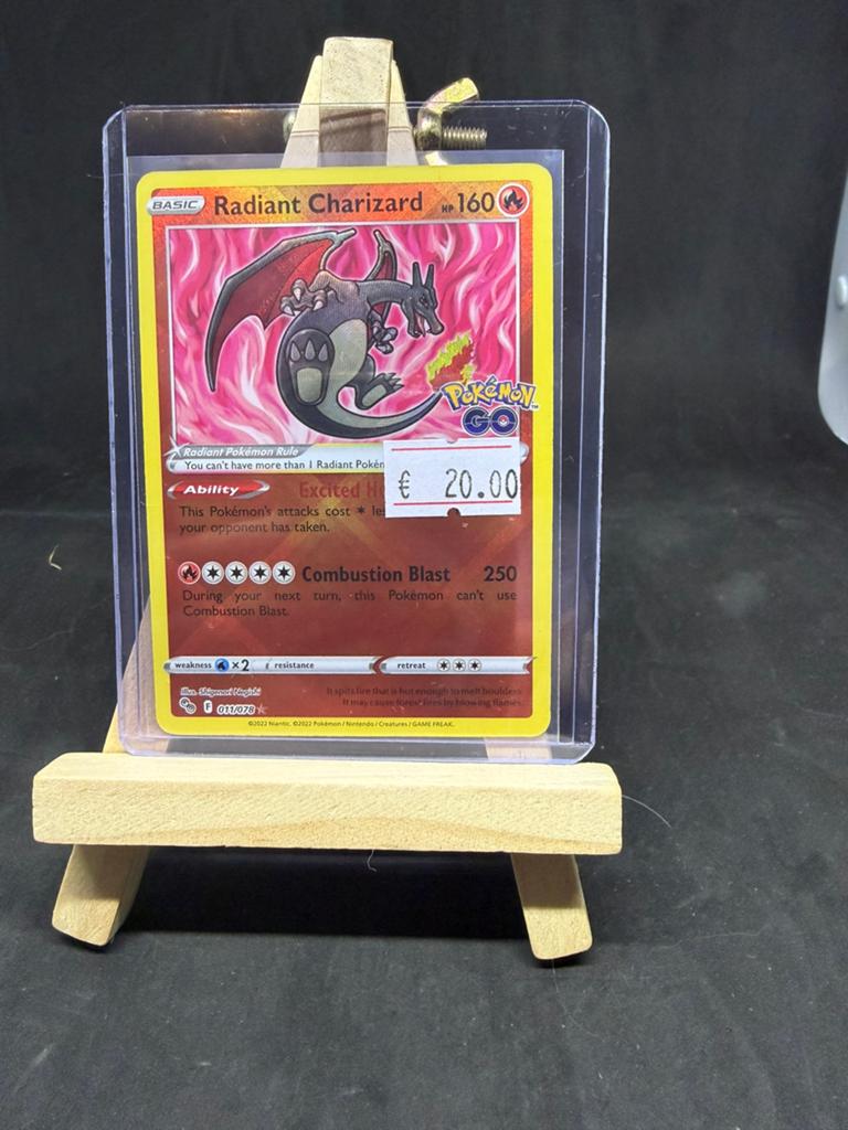 Radiant charizard pokemon go 011 nm/nm, Hobby en Vrije tijd, Verzamelkaartspellen | Pokémon, Ophalen of Verzenden, Zo goed als nieuw
