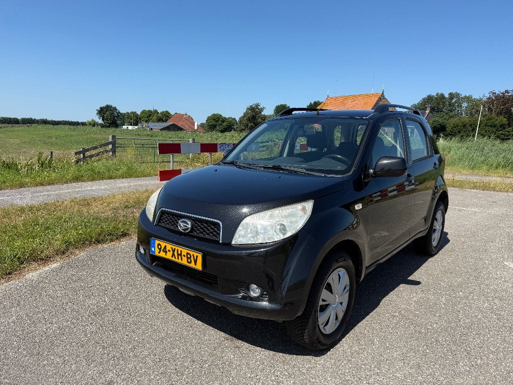 Daihatsu Terios 1.5 2WD AUT 2007 Zwart (NL auto), Auto's, 1350 kg, Stof, Zwart, 400 kg