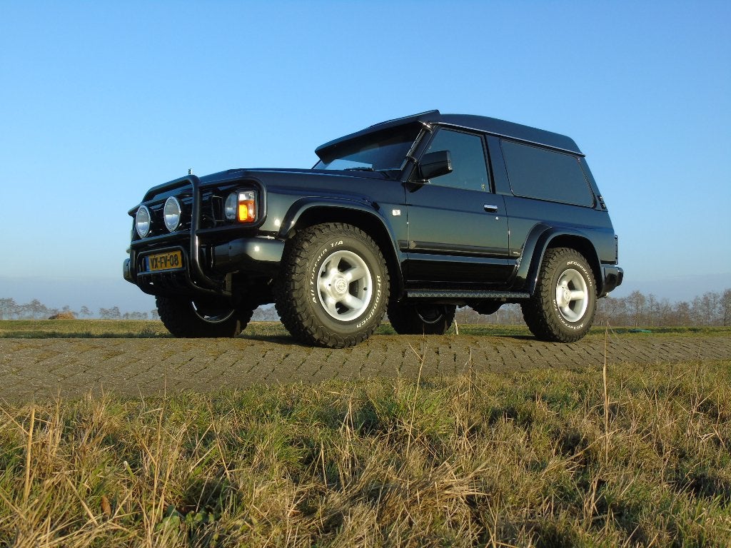 Nissan Patrol Y60 2.8TD "special edition", Auto's, Zwart, Origineel Nederlands, Bedrijf, Te koop