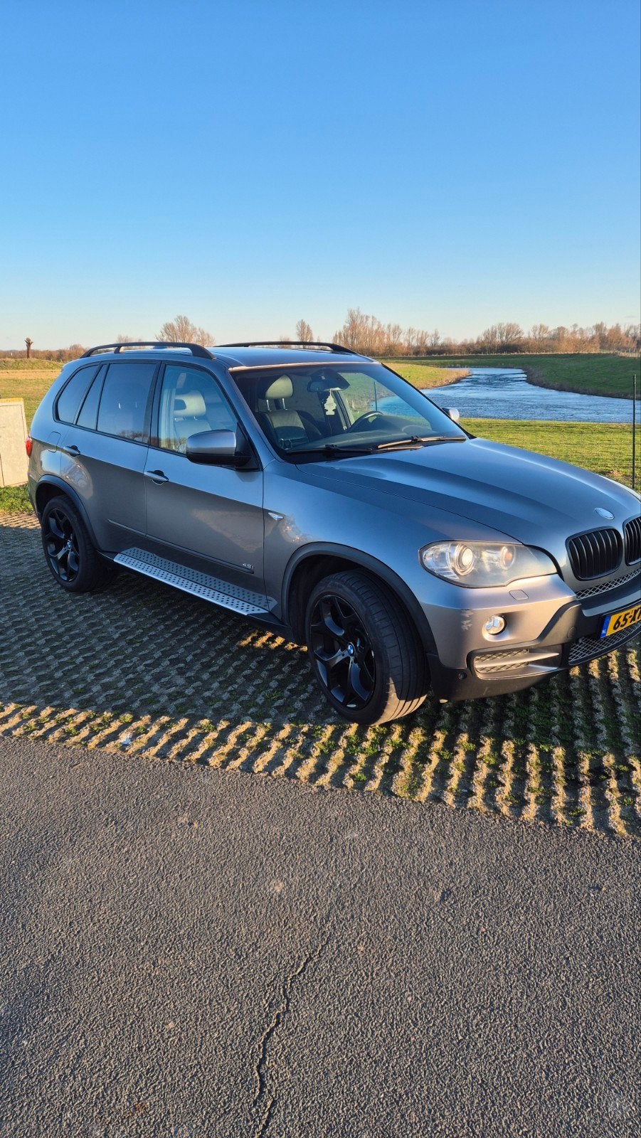 BMW X5 4.8 I AUT 2007 Grijs, Auto's, BMW, 138 €/maand, Leder, Vierwielaandrijving, Particulier