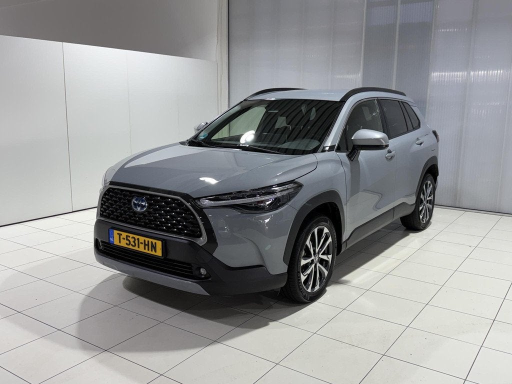 Toyota Corolla Cross Hybrid 140 Dynamic | Dealer onderhouden, Auto's, Toyota, Stof, Gebruikt, 4 cilinders, Origineel Nederlands