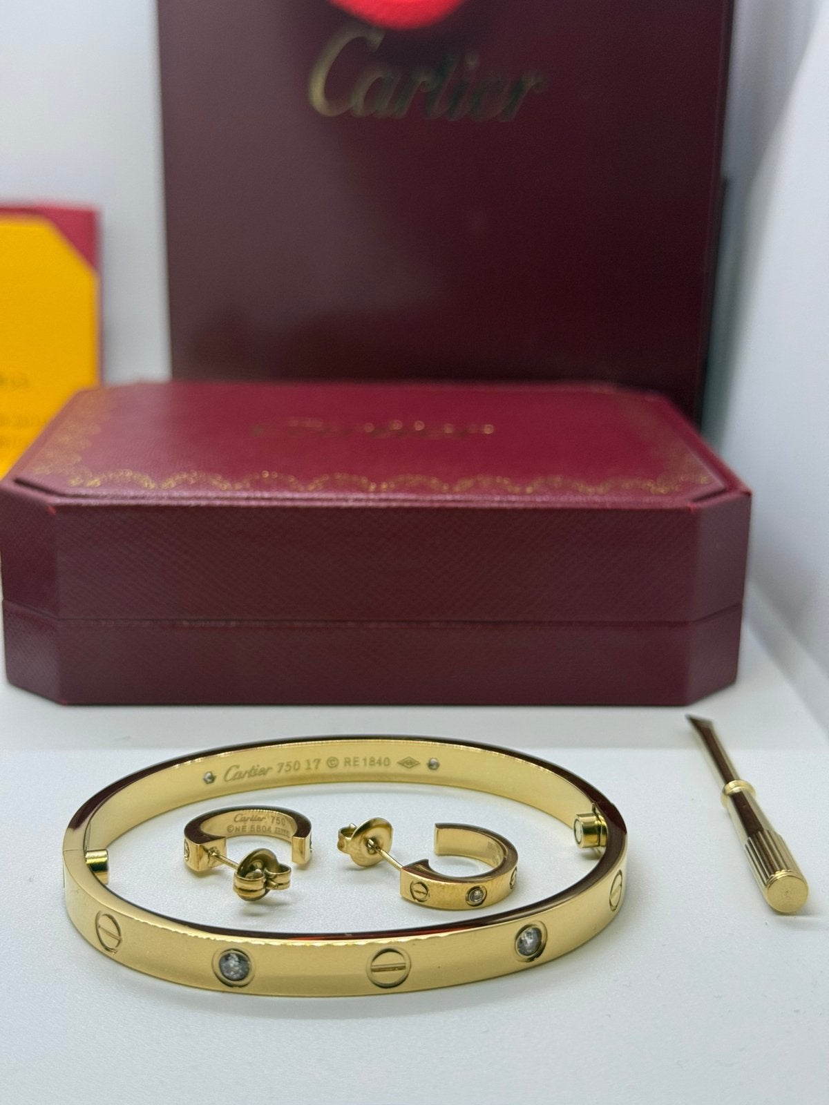 CARTIER LOVE ARMBAND & OORBELLEN, Ophalen of Verzenden, Zo goed als nieuw, Goud, Zilver