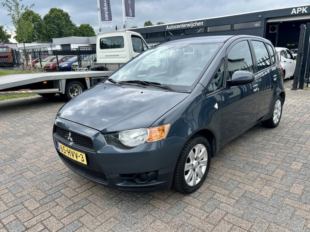 Mitsubishi Colt 1.3 Invite - Nette Auto - Airco (bj 2009), Auto's, Gebruikt, 31 €/maand, Metallic lak, Colt