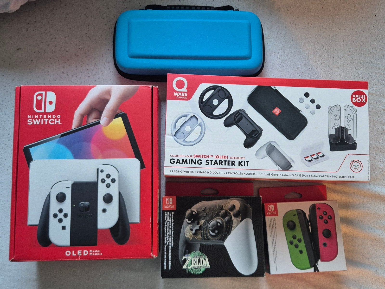 Nintendo Switch OLED + accessoires en microSD 256 Gb, Ophalen of Verzenden, Zo goed als nieuw