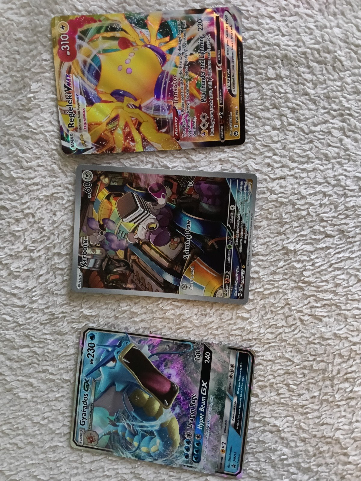 Pokémon Kaarten: Regieleki VMAX, Varoom V, Gyarados GX, Ophalen of Verzenden, Zo goed als nieuw, Meerdere kaarten