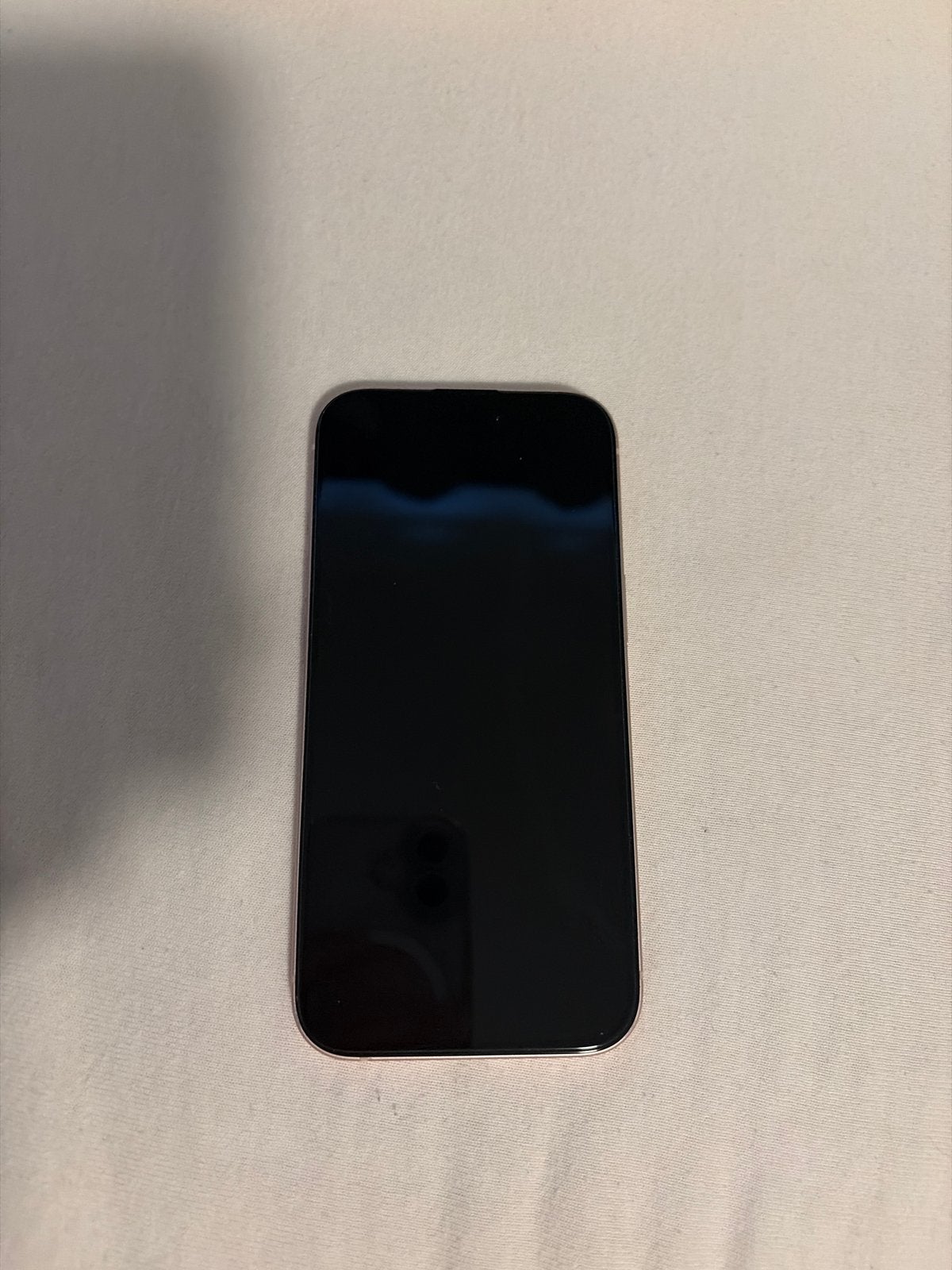 Werkende roze iPhone 15, 128GB, 80% batterij, goed als nieuw