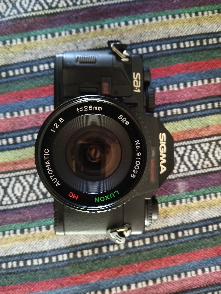 Sigma SA-1 met 3 prime lenzen, Ophalen, Zo goed als nieuw, Spiegelreflex, Overige Merken