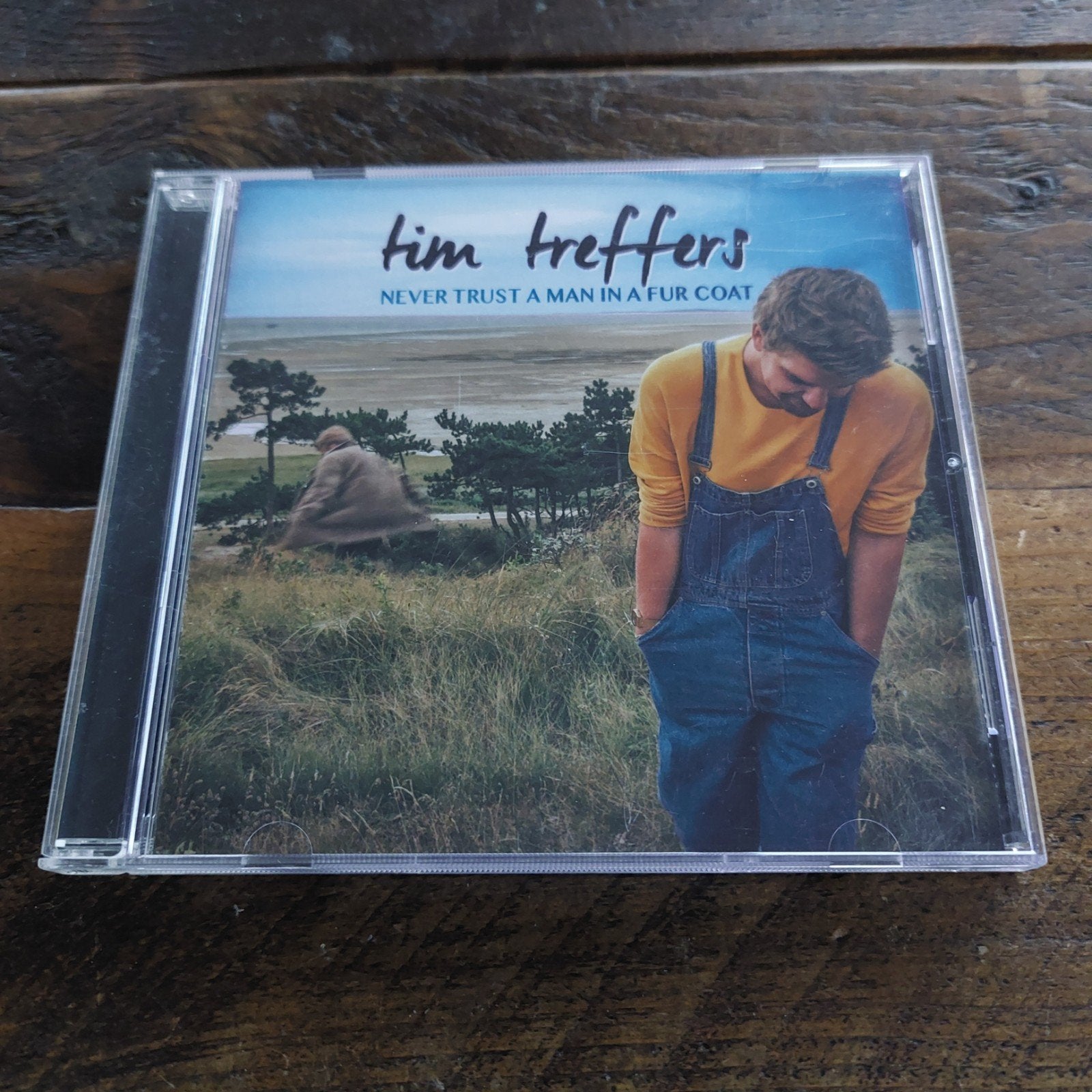 CD Tim Treffers: Never Trust A Man In A Fur Coat, Ophalen of Verzenden, Zo goed als nieuw, Singer-songwriter, Album