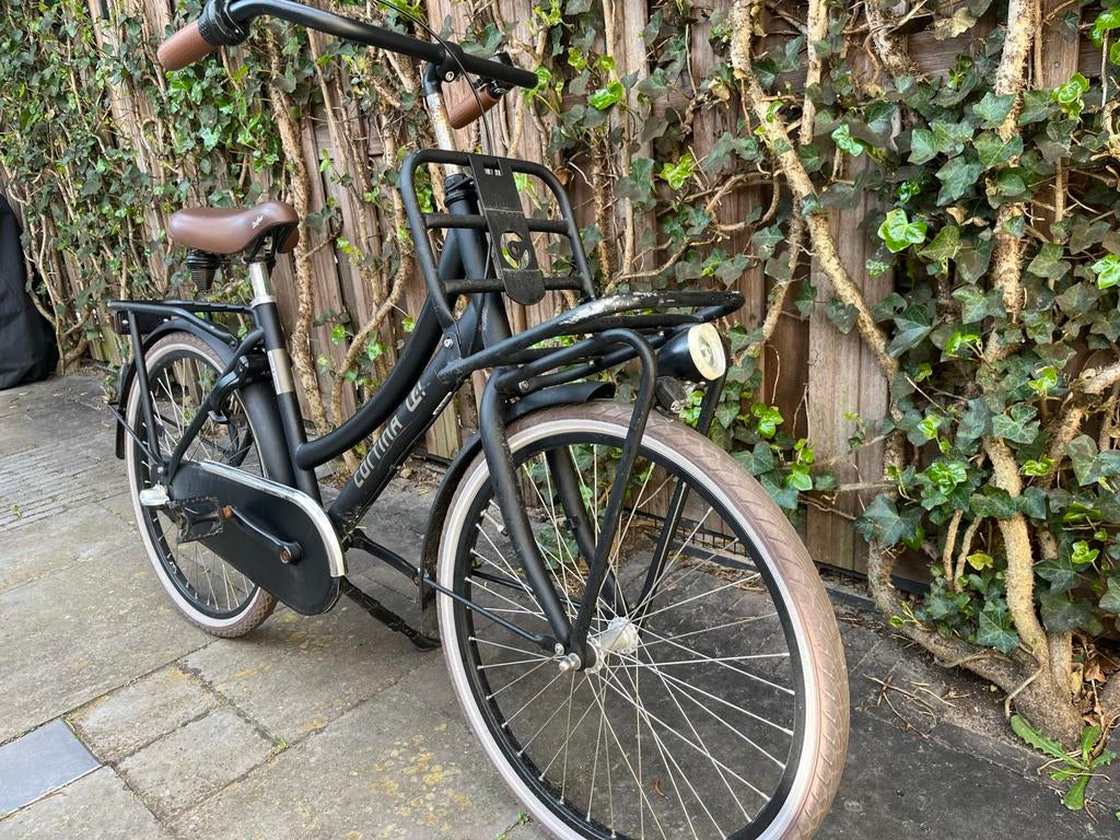 24 inch Cortina fiets met voordrager, Fietsen en Brommers, Fietsen | Dames | Damesfietsen, Overige merken, Terugtraprem, Gebruikt