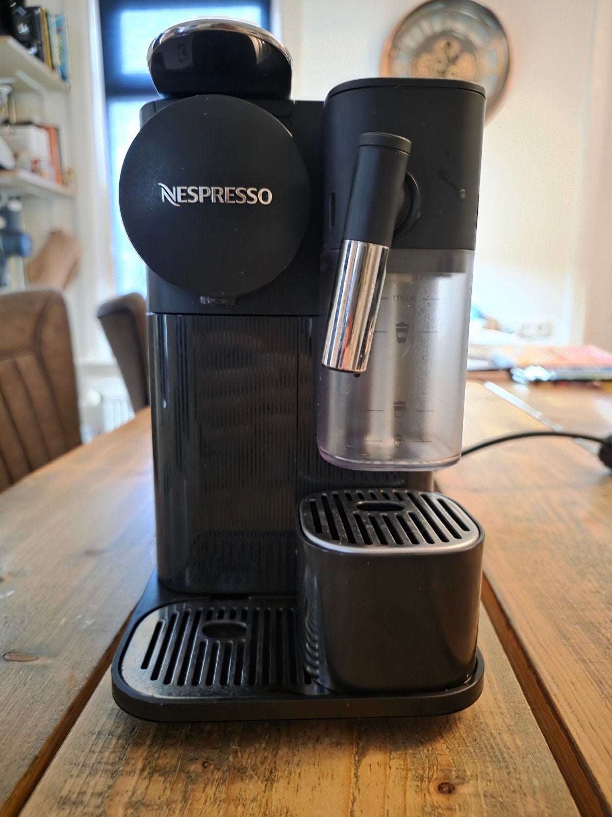 Nespresso DeLonghi koffiezetapparaat, Ophalen