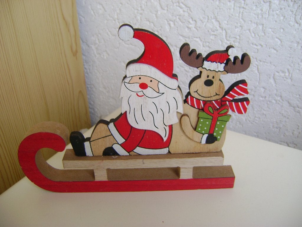 2xhouten kerstman zittend met rendier 21lx18hx3 enop slee 21, Diversen, Ophalen of Verzenden, Zo goed als nieuw