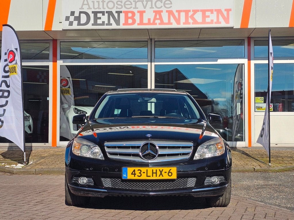 Mercedes-Benz C-klasse 180 K BlueEFFICIENCY Bns Edition Avan, Auto's, Mercedes-Benz, Gebruikt, Leder en Stof, Zwart, Handgeschakeld