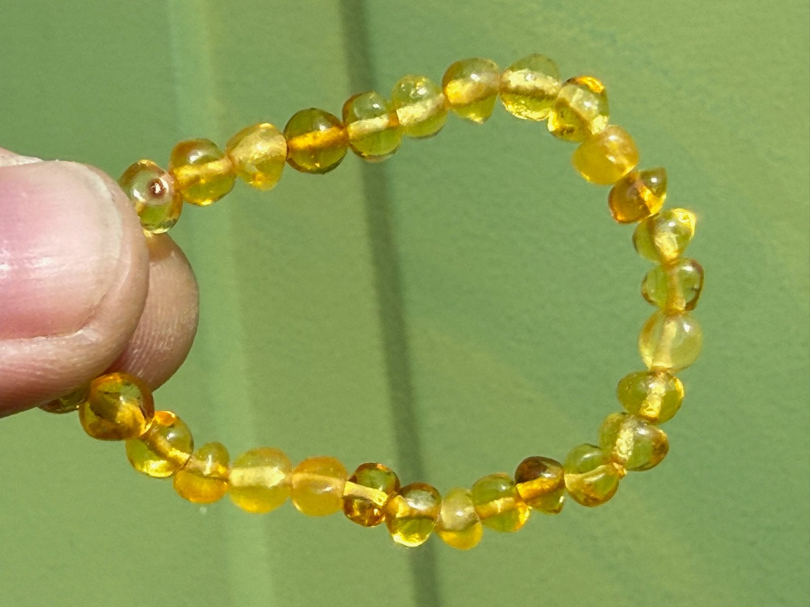 Barnsteen armband enkelbandje baby, Ophalen of Verzenden, Mineraal