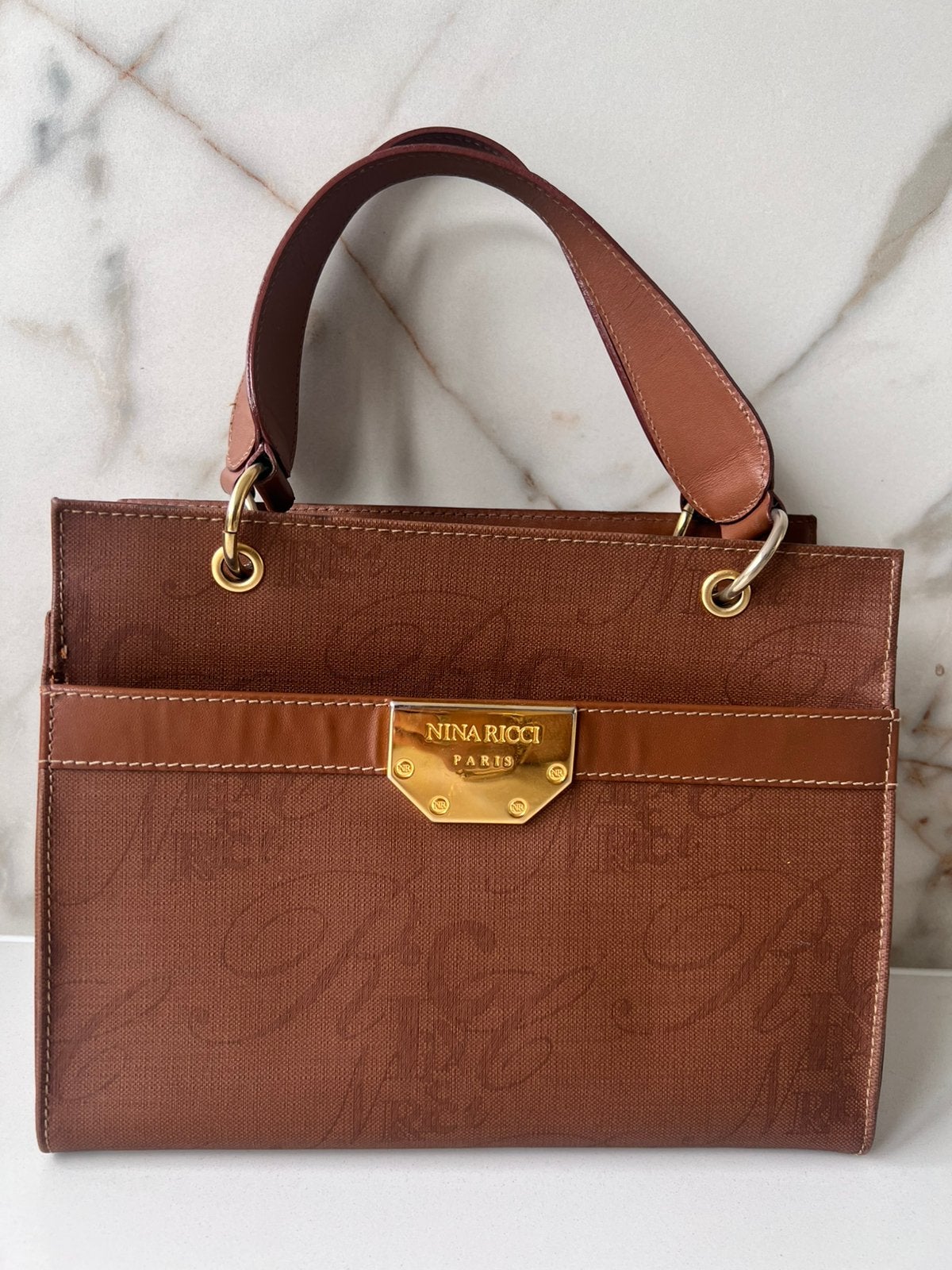 NINA RICCI COGNAC BRUIN ECHT LEREN HANDTAS HAND TAS, Ophalen of Verzenden, Gebruikt, Bruin, Handtas